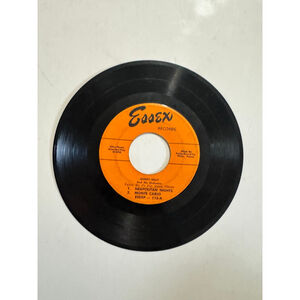 1954 Essex Records 45 RPM 
Monty Kelly's Orchestra “Takes Me To
Far Away Places”